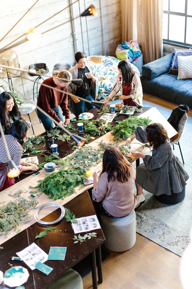People doing arts and crafts with plants